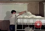 Image of airmen in trailer Diego Garcia Island Indian Ocean, 1979, second 8 stock footage video 65675055643