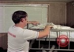 Image of airmen in trailer Diego Garcia Island Indian Ocean, 1979, second 12 stock footage video 65675055643