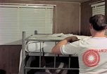 Image of airmen in trailer Diego Garcia Island Indian Ocean, 1979, second 15 stock footage video 65675055643