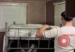Image of airmen in trailer Diego Garcia Island Indian Ocean, 1979, second 16 stock footage video 65675055643