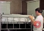 Image of airmen in trailer Diego Garcia Island Indian Ocean, 1979, second 17 stock footage video 65675055643