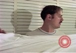 Image of airmen in trailer Diego Garcia Island Indian Ocean, 1979, second 26 stock footage video 65675055643
