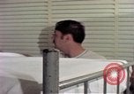 Image of airmen in trailer Diego Garcia Island Indian Ocean, 1979, second 46 stock footage video 65675055643