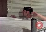 Image of airmen in trailer Diego Garcia Island Indian Ocean, 1979, second 47 stock footage video 65675055643