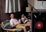 Image of airmen in trailer Diego Garcia Island Indian Ocean, 1979, second 62 stock footage video 65675055643
