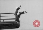 Image of diving stunts New York United States USA, 1958, second 9 stock footage video 65675055657