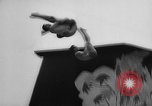 Image of diving stunts New York United States USA, 1958, second 13 stock footage video 65675055657