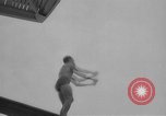 Image of diving stunts New York United States USA, 1958, second 23 stock footage video 65675055657
