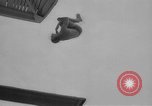 Image of diving stunts New York United States USA, 1958, second 24 stock footage video 65675055657