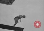 Image of diving stunts New York United States USA, 1958, second 25 stock footage video 65675055657
