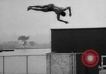 Image of diving stunts New York United States USA, 1958, second 30 stock footage video 65675055657