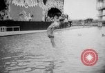 Image of diving stunts New York United States USA, 1958, second 37 stock footage video 65675055657