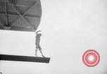 Image of diving stunts New York United States USA, 1958, second 38 stock footage video 65675055657