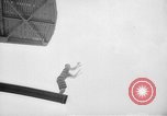 Image of diving stunts New York United States USA, 1958, second 39 stock footage video 65675055657