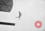 Image of diving stunts New York United States USA, 1958, second 40 stock footage video 65675055657