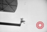 Image of diving stunts New York United States USA, 1958, second 47 stock footage video 65675055657