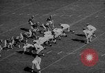Standbild Fußballspiel East Lansing Michigan USA, 1958, aus Sekunde 12 historischem Filmmaterial Videoclip 65675055663