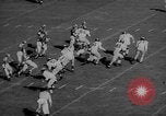 Standbild Fußballspiel East Lansing Michigan USA, 1958, aus Sekunde 13 historischem Filmmaterial Videoclip 65675055663