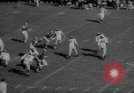 Standbild Fußballspiel East Lansing Michigan USA, 1958, aus Sekunde 14 historischem Filmmaterial Videoclip 65675055663