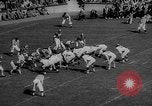 Standbild Fußballspiel East Lansing Michigan USA, 1958, aus Sekunde 19 historischem Filmmaterial Videoclip 65675055663