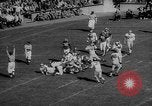 Standbild Fußballspiel East Lansing Michigan USA, 1958, aus Sekunde 23 historischem Filmmaterial Videoclip 65675055663