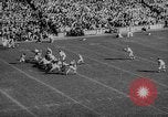 Standbild Fußballspiel East Lansing Michigan USA, 1958, aus Sekunde 27 historischem Filmmaterial Videoclip 65675055663