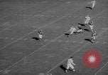 Standbild Fußballspiel East Lansing Michigan USA, 1958, aus Sekunde 34 historischem Filmmaterial Videoclip 65675055663