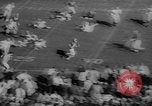 Standbild Fußballspiel East Lansing Michigan USA, 1958, aus Sekunde 36 historischem Filmmaterial Videoclip 65675055663