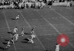 Standbild Fußballspiel East Lansing Michigan USA, 1958, aus Sekunde 39 historischem Filmmaterial Videoclip 65675055663