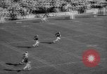 Standbild Fußballspiel East Lansing Michigan USA, 1958, aus Sekunde 42 historischem Filmmaterial Videoclip 65675055663