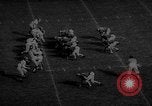 Standbild Fußballspiel East Lansing Michigan USA, 1958, aus Sekunde 50 historischem Filmmaterial Videoclip 65675055663