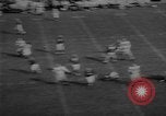 Standbild Fußballspiel East Lansing Michigan USA, 1958, aus Sekunde 54 historischem Filmmaterial Videoclip 65675055663