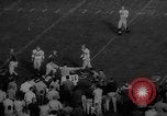 Standbild Fußballspiel East Lansing Michigan USA, 1958, aus Sekunde 59 historischem Filmmaterial Videoclip 65675055663