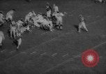 Standbild Fußballspiel East Lansing Michigan USA, 1958, aus Sekunde 62 historischem Filmmaterial Videoclip 65675055663
