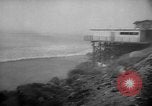 Immagine di Infuriano gli incendi forestali Malibu California USA, 1958, secondo 7 filmato di repertorio 65675055665