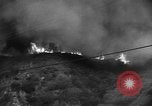 Immagine di Infuriano gli incendi forestali Malibu California USA, 1958, secondo 15 filmato di repertorio 65675055665