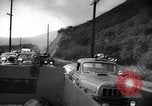 Immagine di Infuriano gli incendi forestali Malibu California USA, 1958, secondo 16 filmato di repertorio 65675055665