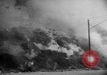 Immagine di Infuriano gli incendi forestali Malibu California USA, 1958, secondo 30 filmato di repertorio 65675055665