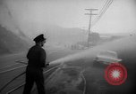 Immagine di Infuriano gli incendi forestali Malibu California USA, 1958, secondo 37 filmato di repertorio 65675055665