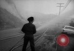 Immagine di Infuriano gli incendi forestali Malibu California USA, 1958, secondo 38 filmato di repertorio 65675055665