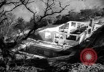 Immagine di Infuriano gli incendi forestali Malibu California USA, 1958, secondo 54 filmato di repertorio 65675055665