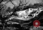 Immagine di Infuriano gli incendi forestali Malibu California USA, 1958, secondo 56 filmato di repertorio 65675055665
