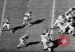 Immagine di Football americano Seattle Washington USA, 1955, secondo 15 filmato di repertorio 65675055714