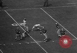 Immagine di Football americano Los Angeles California USA, 1957, secondo 12 filmato di repertorio 65675055746