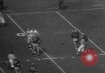 Immagine di Football americano Los Angeles California USA, 1957, secondo 13 filmato di repertorio 65675055746