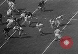 Immagine di Football americano Los Angeles California USA, 1957, secondo 18 filmato di repertorio 65675055746