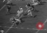 Immagine di Football americano Los Angeles California USA, 1957, secondo 19 filmato di repertorio 65675055746