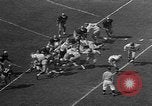 Immagine di Football americano Los Angeles California USA, 1957, secondo 23 filmato di repertorio 65675055746