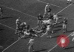 Immagine di Football americano Los Angeles California USA, 1957, secondo 25 filmato di repertorio 65675055746
