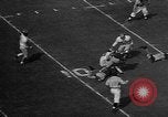 Immagine di Football americano Los Angeles California USA, 1957, secondo 37 filmato di repertorio 65675055746